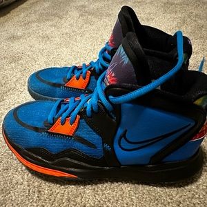 Kids Nike Kyrie basketball shoes size 4
